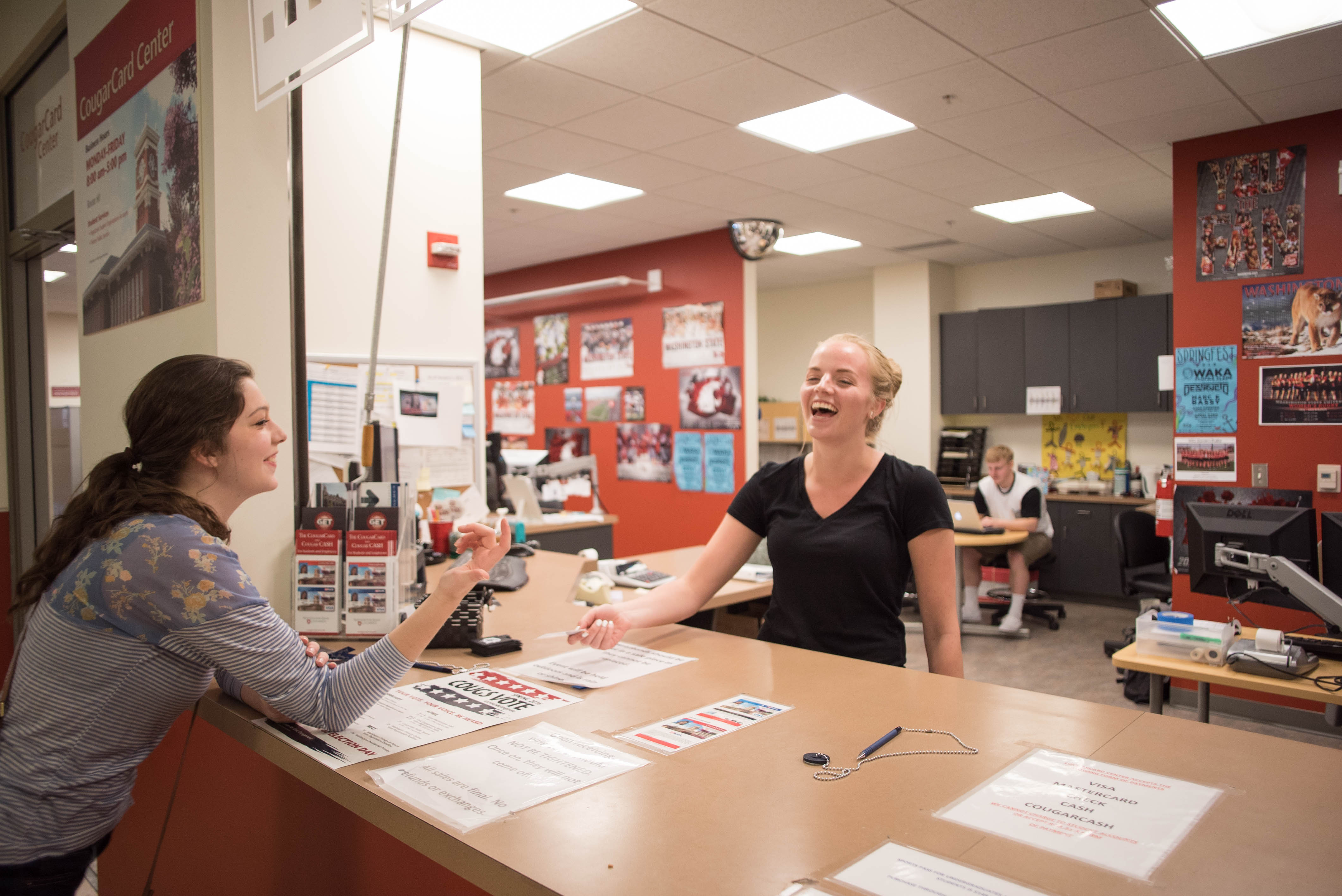 Student at CougarCard Center Counter